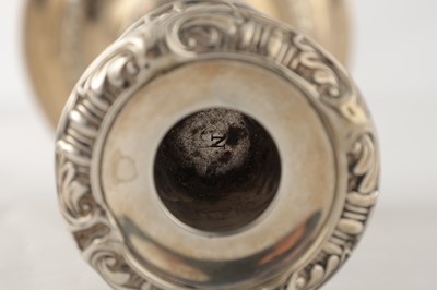 Lot 142 - A PAIR OF REGENCY SILVER CANDLESTICKS