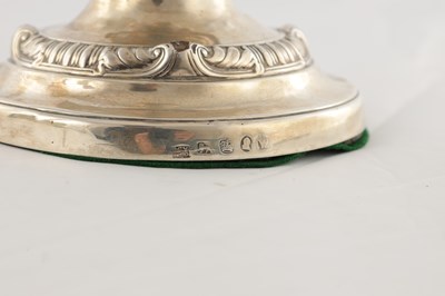 Lot 142 - A PAIR OF REGENCY SILVER CANDLESTICKS