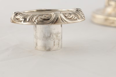 Lot 142 - A PAIR OF REGENCY SILVER CANDLESTICKS