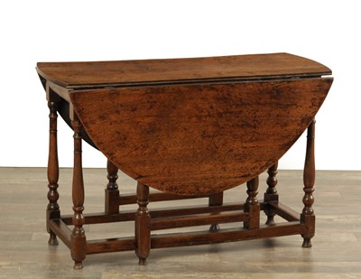 Lot 1479 - A 17TH CENTURY OAK GATELEG TABLE