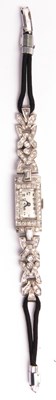 Lot 165 - An Art Deco style Silver metal and Diamond...