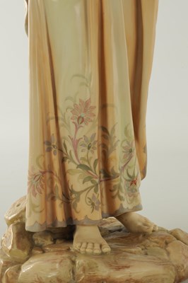 Lot 44 - A PAIR OF LATE 19TH CENTURY ROYAL WORCESTER PORCELAIN FIGURES OF WATER CARRIERS
