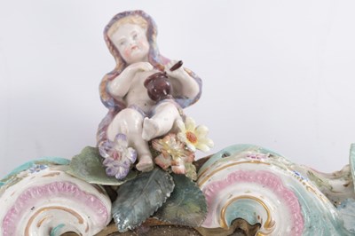 Lot 35 - A PAIR OF MEISSEN STYLE PORCELAIN HANGING MIRRORS