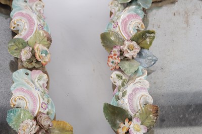 Lot 35 - A PAIR OF MEISSEN STYLE PORCELAIN HANGING MIRRORS