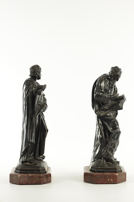 Lot 585 - A PAIR OF LATE 19TH CENTURY FRENCH PATINATED BRONZE FIGURES OF SAINT MARK AND SAINT LUKE ON ROUGE MARBLE BASES