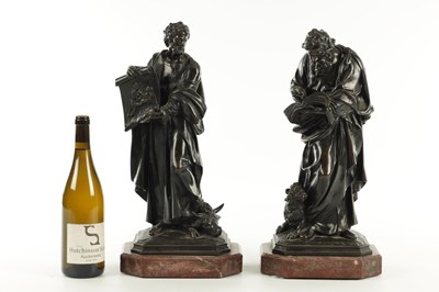 Lot 585 - A PAIR OF LATE 19TH CENTURY FRENCH PATINATED BRONZE FIGURES OF SAINT MARK AND SAINT LUKE ON ROUGE MARBLE BASES