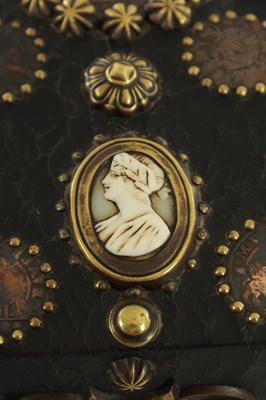 Lot 570 - A 19TH CENTURY CONTINENTAL LEATHER-COVERED AND STUDDED CASKET