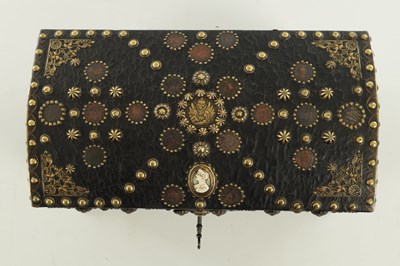 Lot 570 - A 19TH CENTURY CONTINENTAL LEATHER-COVERED AND STUDDED CASKET