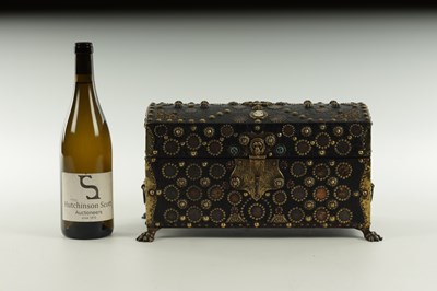 Lot 570 - A 19TH CENTURY CONTINENTAL LEATHER-COVERED AND STUDDED CASKET