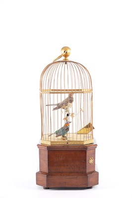 Lot 537 - A LATE 19TH CENTURY COIN-OPERATED WALNUT CASED SINGING BIRD AUTOMATON