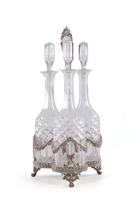 Lot 372 - HENRY WILKINSON & CO. A VICTORIAN SILVER AND CUT GLASS DECANTER STAND