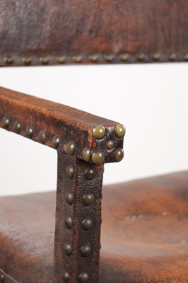 Lot 1580 - A 17TH CENTURY OAK FRAMED LEATHER UPHOLSTERED ARMCHAIR