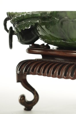 Lot 138 - A PAIR OF LATE QING DYNASTY CHINESE JADE DISHES ON STANDS