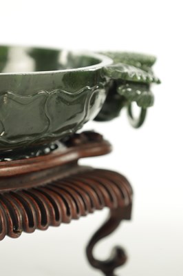 Lot 138 - A PAIR OF LATE QING DYNASTY CHINESE JADE DISHES ON STANDS