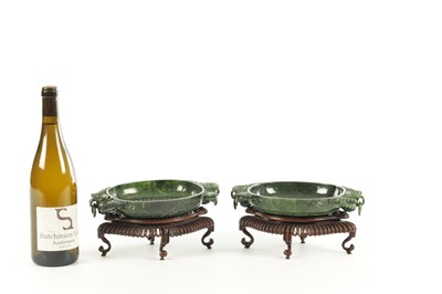 Lot 138 - A PAIR OF LATE QING DYNASTY CHINESE JADE DISHES ON STANDS