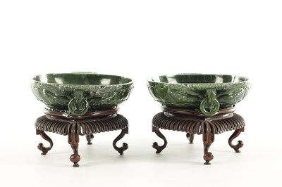 Lot 138 - A PAIR OF LATE QING DYNASTY CHINESE JADE DISHES ON STANDS