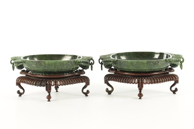 Lot 138 - A PAIR OF LATE QING DYNASTY CHINESE JADE DISHES ON STANDS