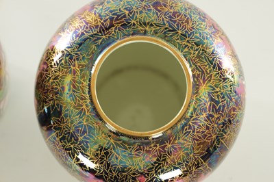 Lot 32 - A FINE PAIR OF 20TH CENTURY DAISY MAKEIG-JONES WEDGWOOD FAIRYLAND LUSTRE MALFREY GINGER JARS AND COVERS
