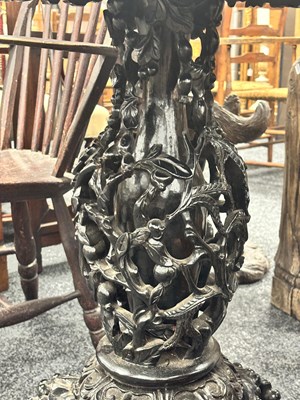 Lot 183 - A GOOD 19TH CENTURY RETICULATED CARVED HARDWOOD CHINESE CENTRE TABLE