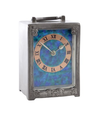 Lot 1028 - ARCHIBALD KNOX FOR LIBERTY & CO. AN ART NOUVEAU 'TUDRIC' PEWTER CARRIAGE CLOCK