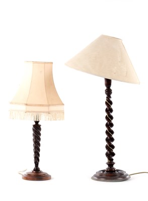 Lot 292 - TWO 20TH CENTURY BARLEY TWIST OAK AND FRUITWOOD TABLE LAMPS
