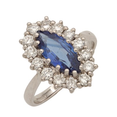 Lot 312 - AN 18CT WHITE GOLD SAPPHIRE AND DIAMOND RING