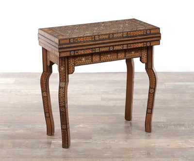Lot 91 - A 19TH CENTURY MIDDLE EASTERN MARQUETRY FOLDING GAMES TABLE