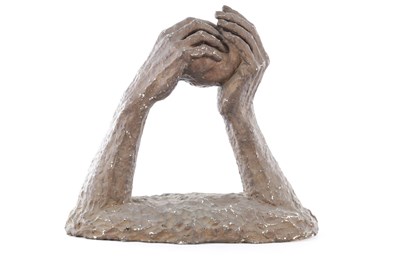 Lot A 20TH CENTURY PLASTER SCULPTURE OF TWO HANDS HOLDING A ROCK
