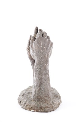 Lot A 20TH CENTURY PLASTER SCULPTURE OF TWO HANDS HOLDING A ROCK