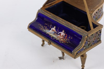 Lot 786 - A LATE 19TH CENTURY VIENNESE ENAMEL AND GILT BRASS GRAND PIANO FORM MUSIC BOX