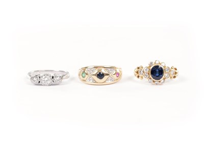Lot 284 - A COLLECTION OF THREE LADIES 18CT GOLD RINGS