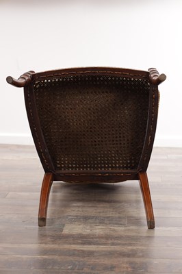 Lot A 19TH CENTURY SHERATON STYLE PAINTED SATINWOOD BERGERE ARMCHAIR