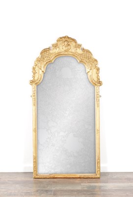 Lot 1217 - A GEORGE II STYLE GILT WOOD HANGING MIRROR