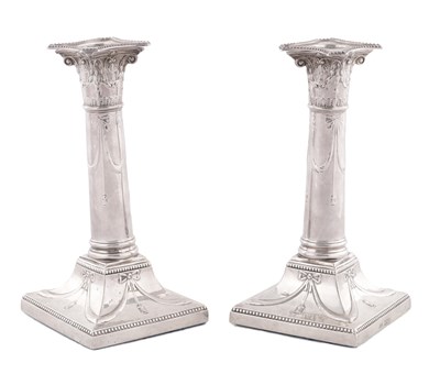 Lot 378 - A PAIR OF EARLY 20TH CENTURY SILVER CANDLESTICKS
