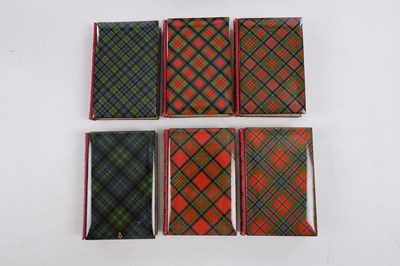 Lot 571 - A SET OF SIX CASED TARTAIN WARE BOOKS
