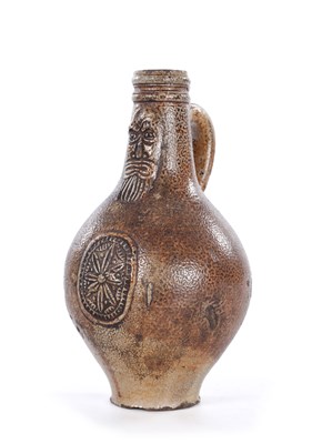 Lot 36 - A 17TH CENTURY RHENISH BELLARMINE JUG