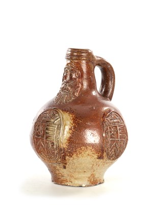 Lot 20 - A 17TH CENTURY RHENISH BELLARMINE JUG WITH COAT OF ARMS