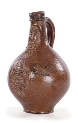 Lot 17 - A 17TH CENTURY RHENISH BELLARMINE JUG