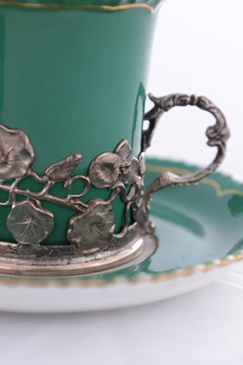Lot 34 - A SET OF SIX ROYAL WORCESTER CERAMIC AND SILVER MOUNTED CUPS AND SAUCERS