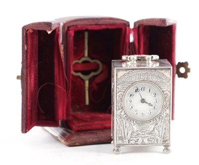Lot 1095 - A FINE LATE 19TH CENTURY ART NOUVEAU STYLE SWISS SILVER MINIATURE BOUDOIR CARRIAGE CLOCK