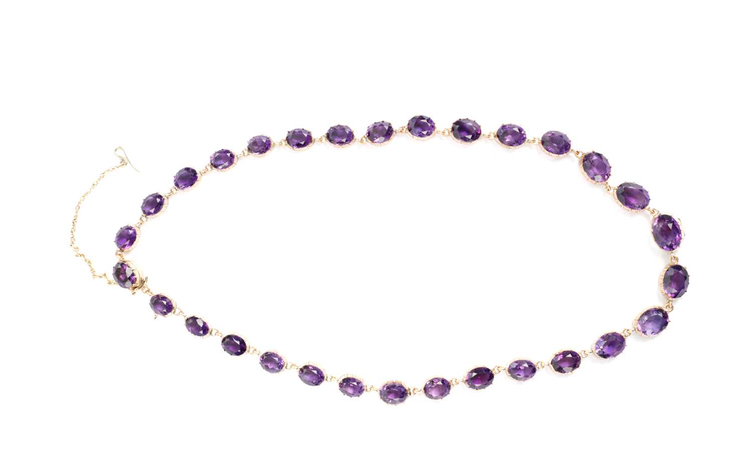 Lot 214 - A 9CT GOLD AMETHYST RIVIERE NECKLACE