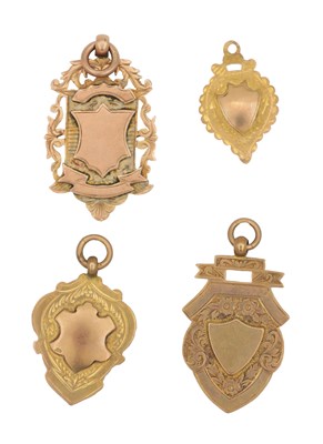 Lot 216 - A COLLECTION OF FOUR 9CT GOLD WATCH FOBS