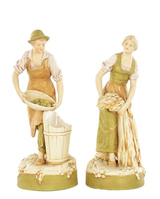 Lot 54 - A PAIR OF 19TH/20TH CENTURY ROYAL DUX PORECELAIN FIGURES