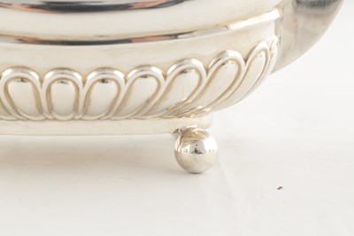 Lot 107 - A GOOD QUALITY GEORGE VI SILVER FOUR PIECE SILVER TEA SERVICE