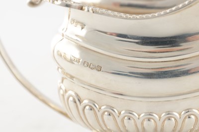 Lot 107 - A GOOD QUALITY GEORGE VI SILVER FOUR PIECE SILVER TEA SERVICE