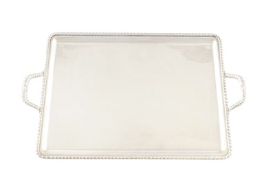 Lot 204 - A 20TH CENTURY CONTINENTAL SILVER TWIN-HANDLED TRAY