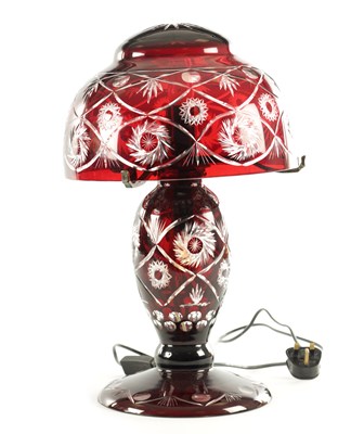 Lot 6 - A 2OTH CENTURY BOHEMIAN RUBY RED CUT GLASS LAMP