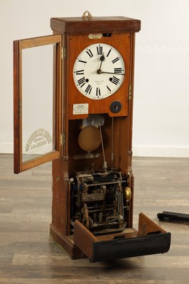 Lot 1388 - NATIONAL TIME RECORDER CO. LTD. A LATE 19TH CENTURY OAK CASED CLOCKING IN MACHINE