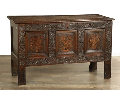 Lot 1469 - A 17TH CENTURY YORKSHIRE CARVED OAK AND MARQUETRY PANELLED COFFER
