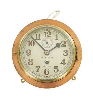 Lot 1264 - A JAPANESE FIRST WORLD WAR EIGHT DAY BULK HEAD CLOCK